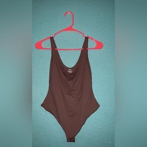 SKIMS thong body suit color umber